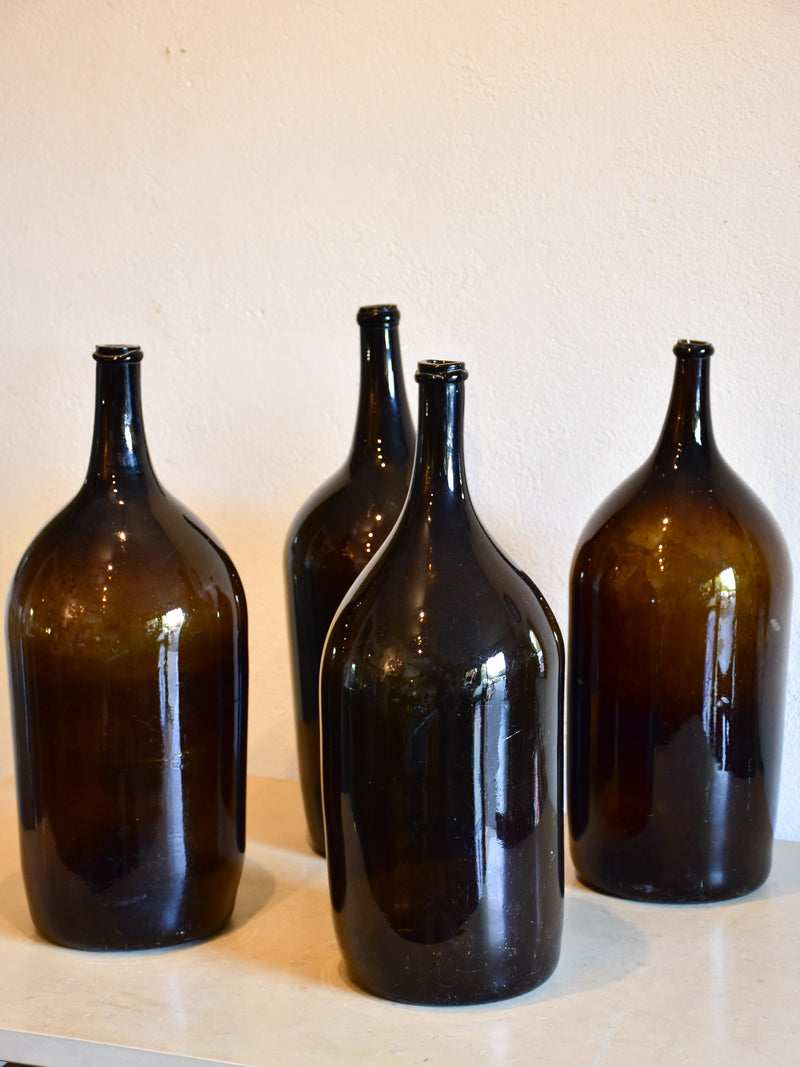 Collection of four large 18th century French bottles