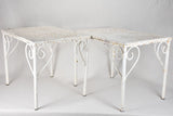 Pair of perforated wrought iron garden coffee tables