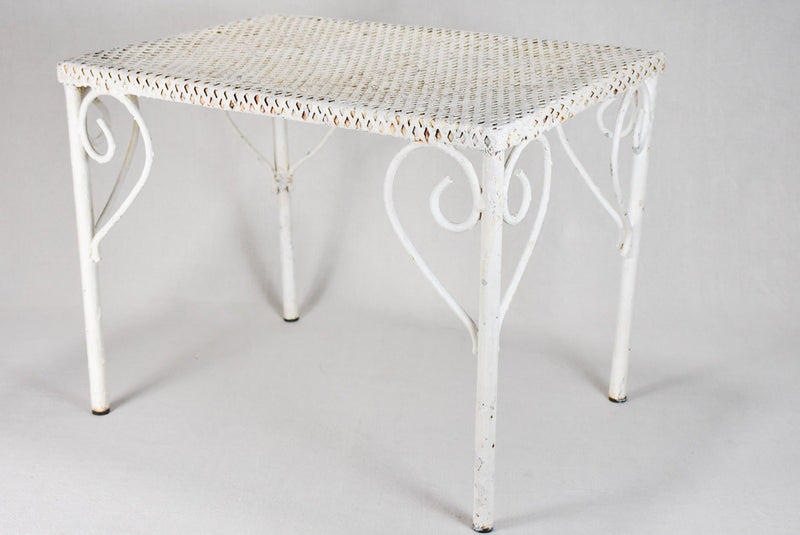 Pair of perforated wrought iron garden coffee tables