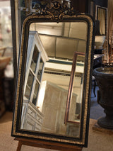 Late 19th century Napoleon III mirror with black and gold frame