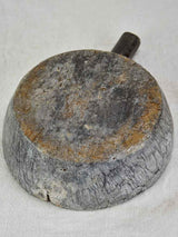 Late 19th century thick round cutting board with handle