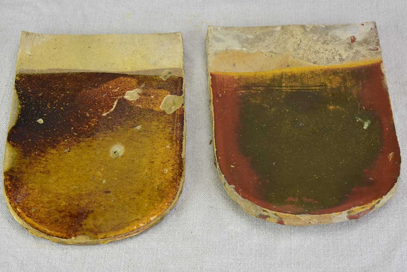 Two antique French glazed roof tiles from Burgundy