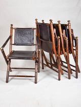 Set of 4 Colonial style folding leather armchairs