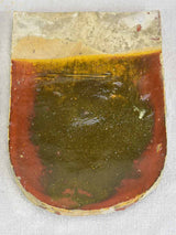 Two antique French glazed roof tiles from Burgundy