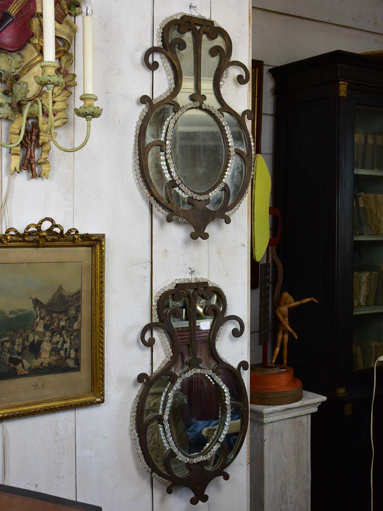 Pair of early 19th-century wrought iron Italian mirrors with beading