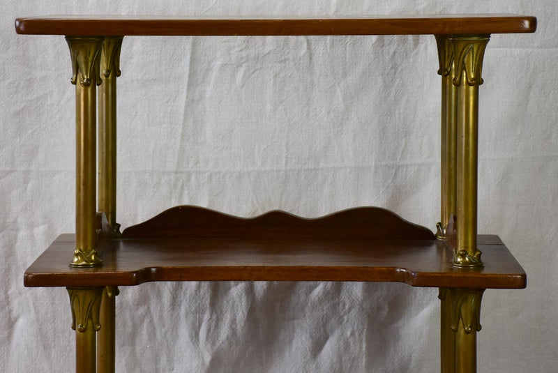 Early twentieth century shelving unit with bronze frame from a boutique 32¼"