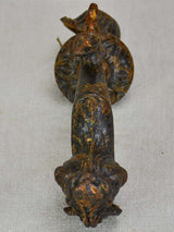Antique cast iron door knocker dolphin and shell motif