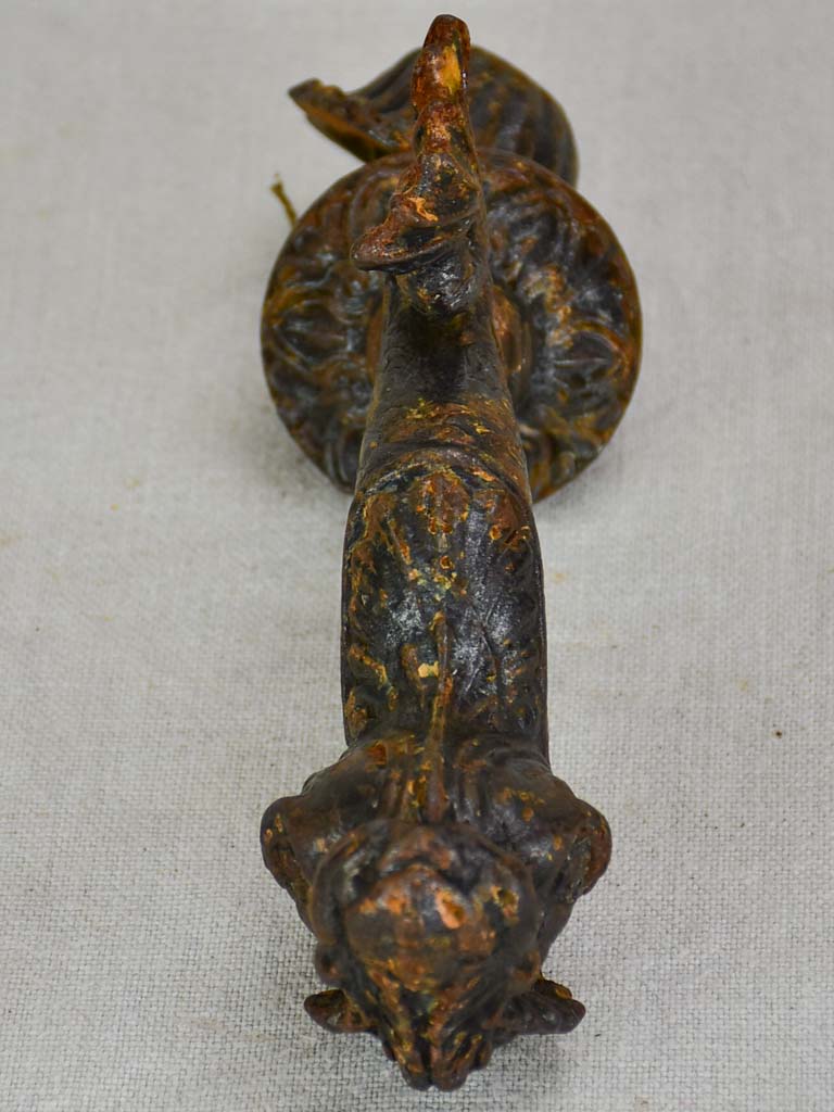 Antique cast iron door knocker dolphin and shell motif