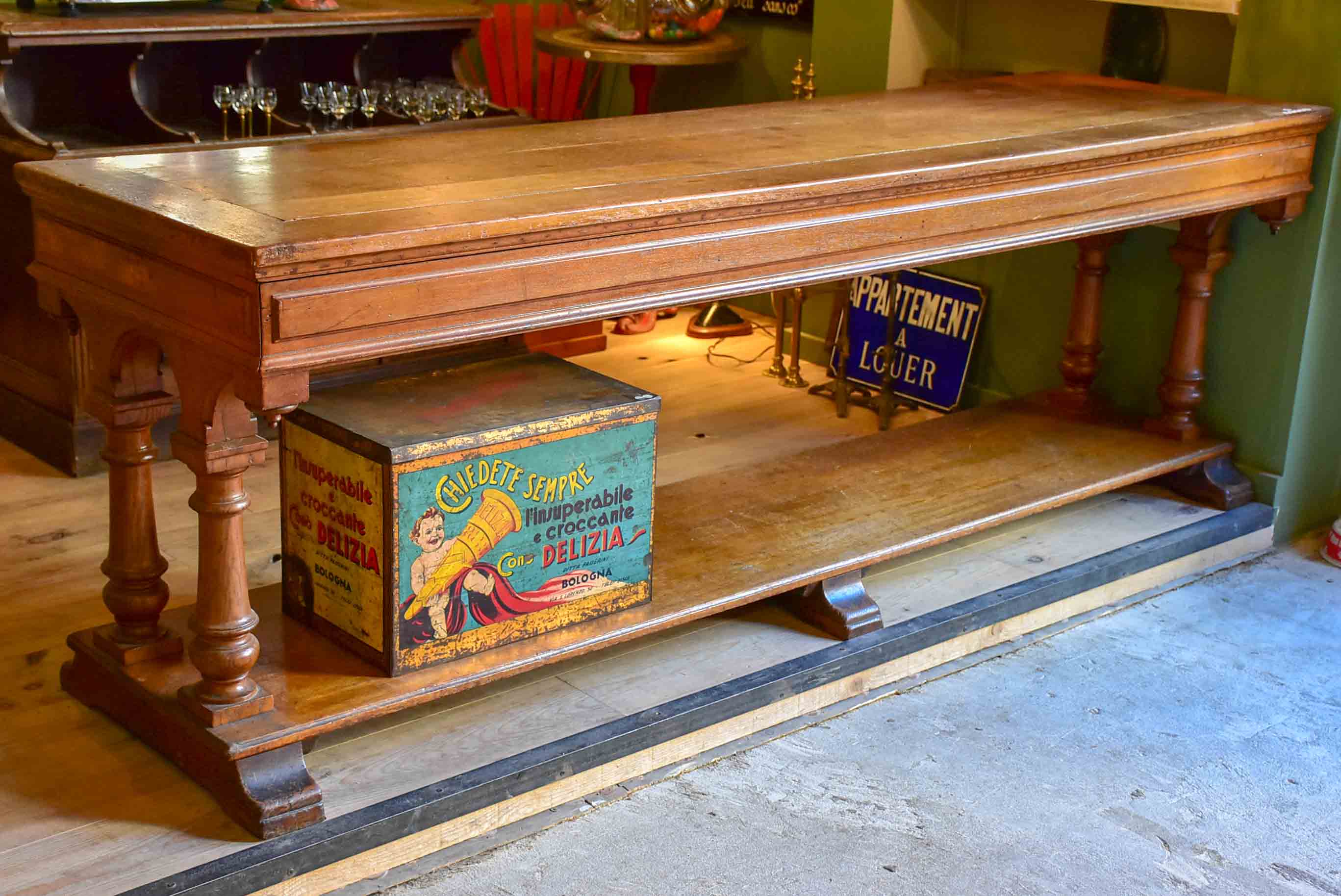 Antique French oak drapery table from a silk boutique