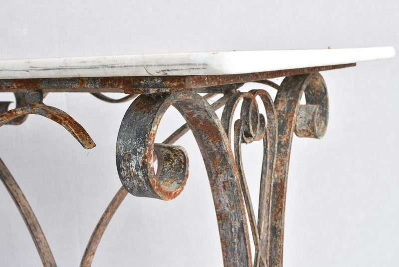 1950s marble presentation table, wrought iron base