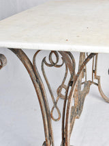1950s marble presentation table, wrought iron base