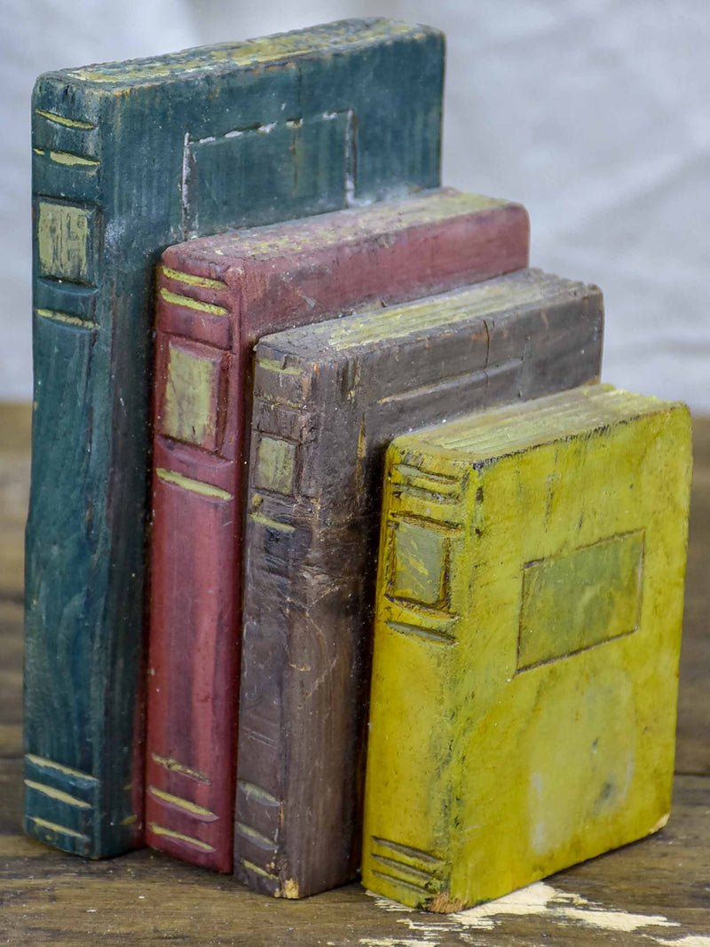 Charming antique wooden sculpture of books 