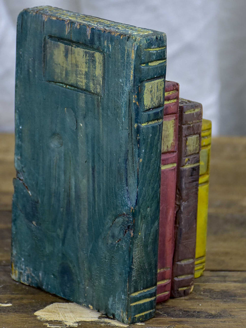 Intricate small early-century book sculpture 