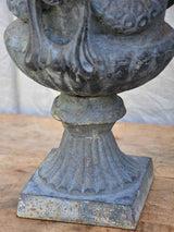 Pair of Napoleon III cast iron garden urns