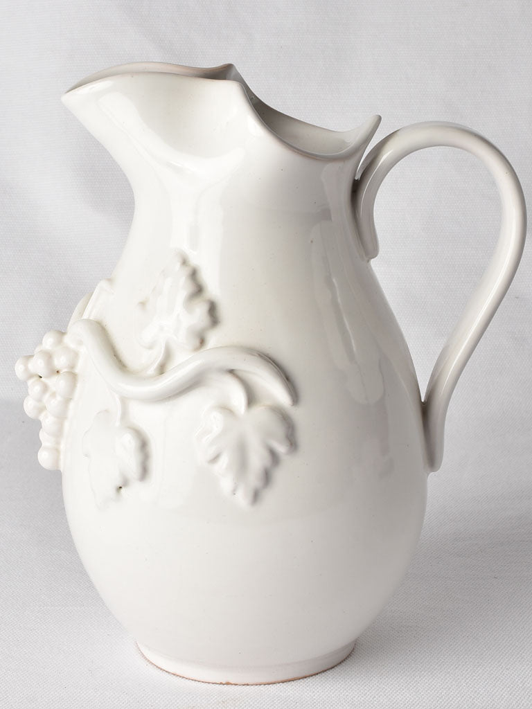 Ivory Tessier grape-decorated ceramic pitcher