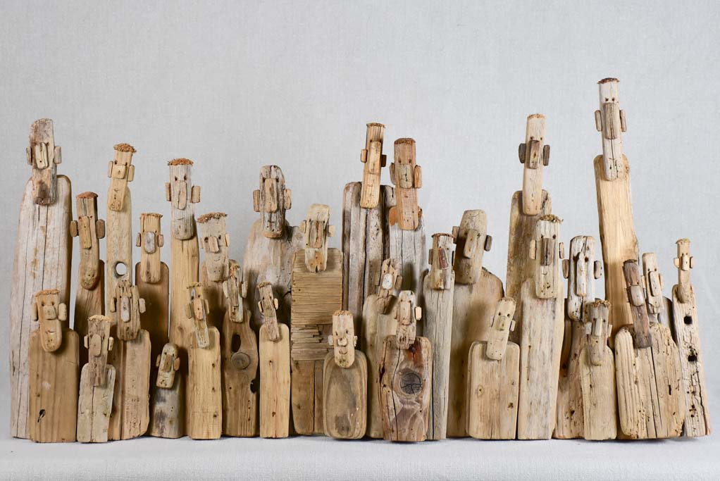 Panoramic driftwood sculpture by JP Dreano - 31 characters 28¾"