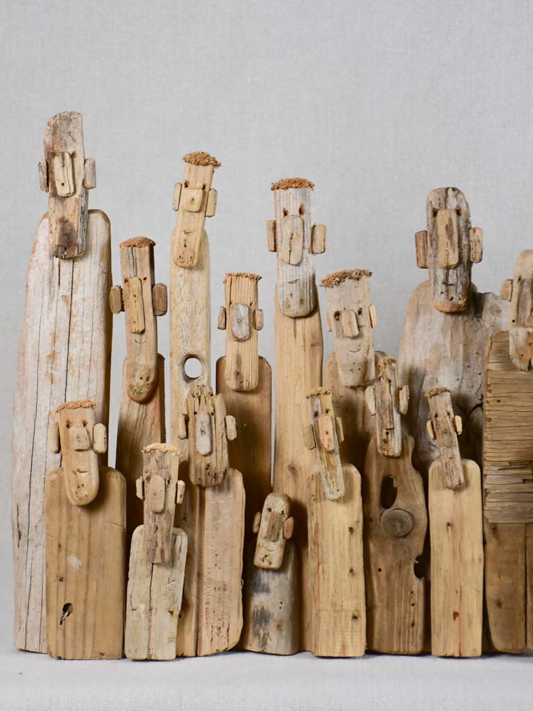 Panoramic driftwood sculpture by JP Dreano - 31 characters 28¾"