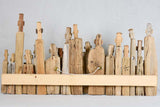 Panoramic driftwood sculpture by JP Dreano - 31 characters 28¾"