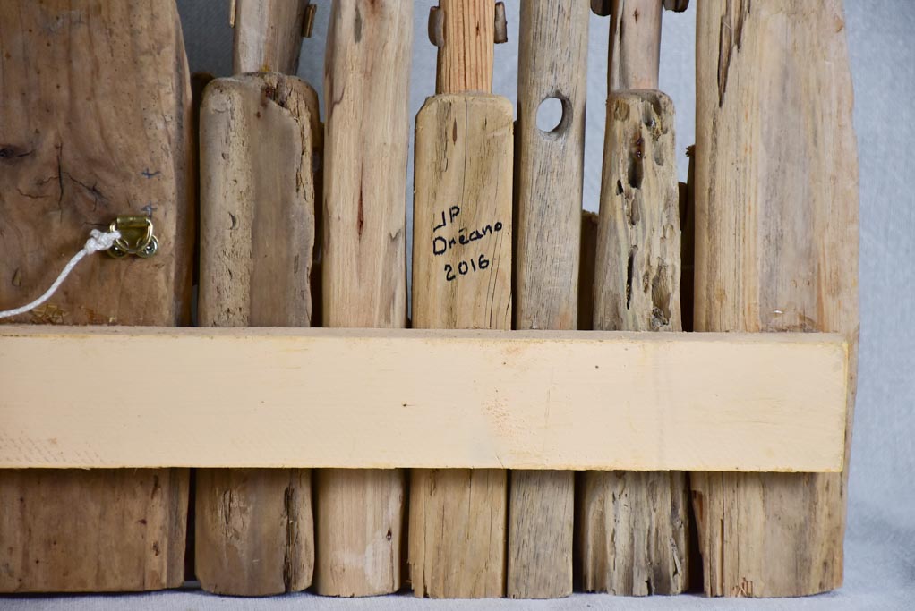 Panoramic driftwood sculpture by JP Dreano - 31 characters 28¾"