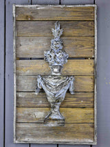 Pair of rustic French wall panels with flower urns