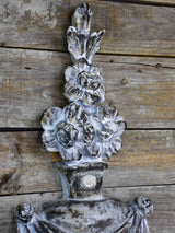 Pair of rustic French wall panels with flower urns