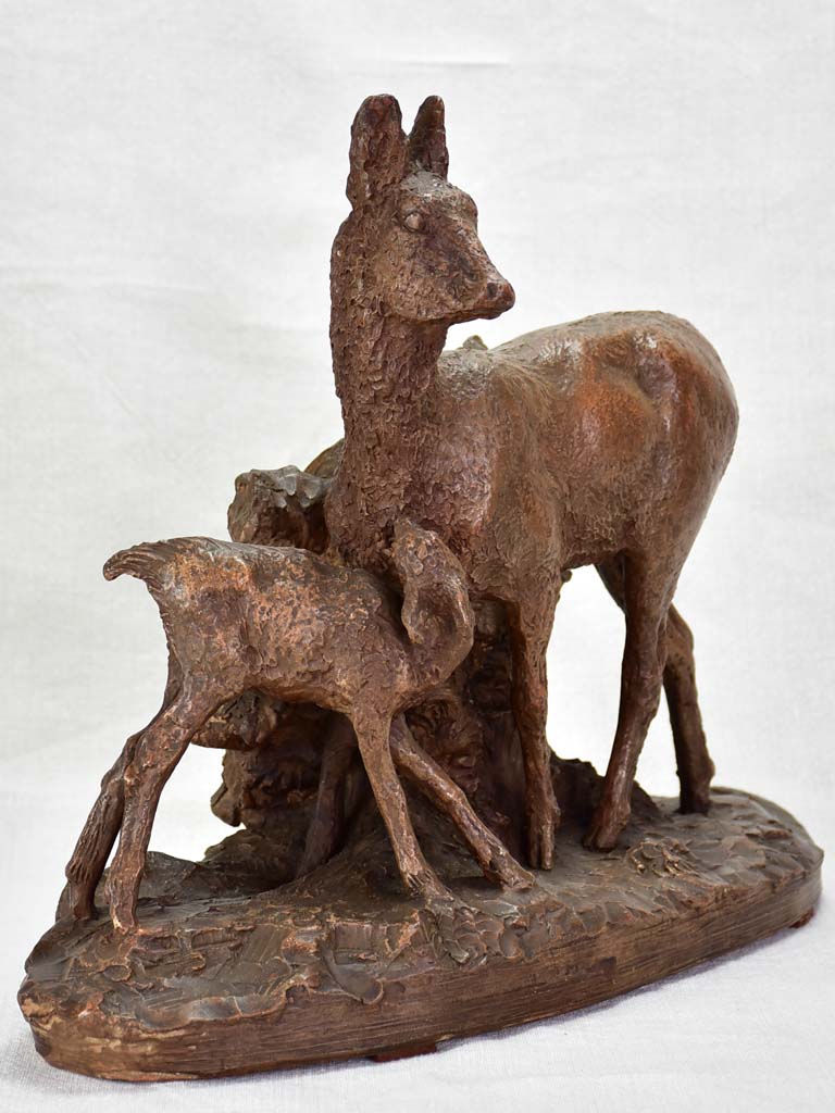 Early 20th Century clay sculpture of a deer and faun 13¾"