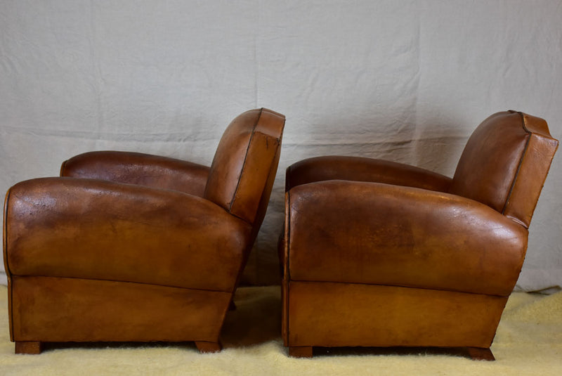 Pair of large mustache back vintage French club chairs