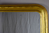 Large gilded Louis Philippe mirror from the 19th Century with simple frame 32¾" x 54¾"