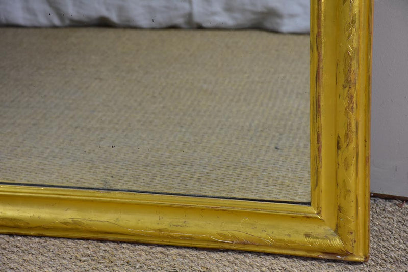Large gilded Louis Philippe mirror from the 19th Century with simple frame 32¾" x 54¾"