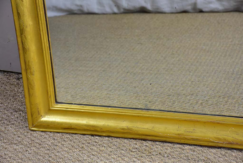 Large gilded Louis Philippe mirror from the 19th Century with simple frame 32¾" x 54¾"