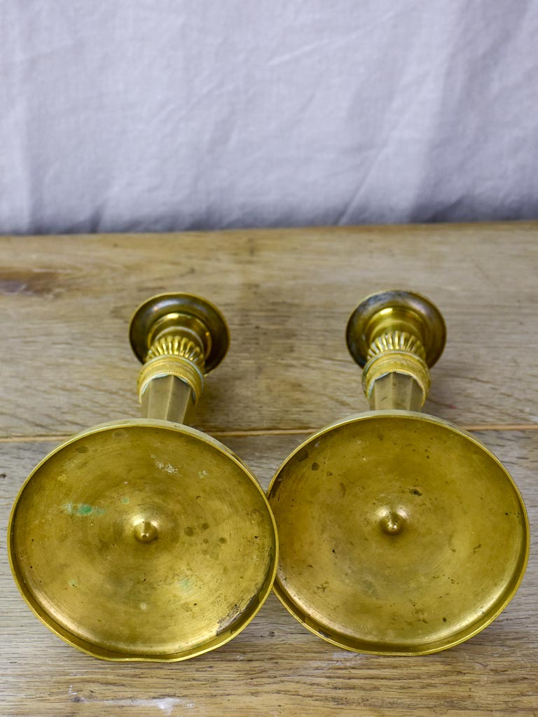 Pair of early 19th Century bronze candlesticks with claw feet