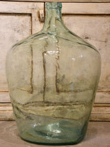 Pair of antique demijohn bottles