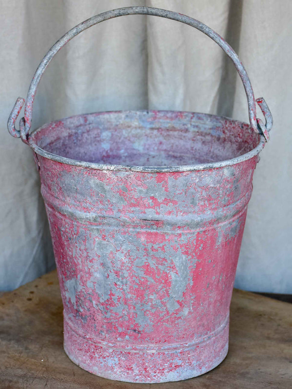 Antique French zinc bucket with red / pink patina