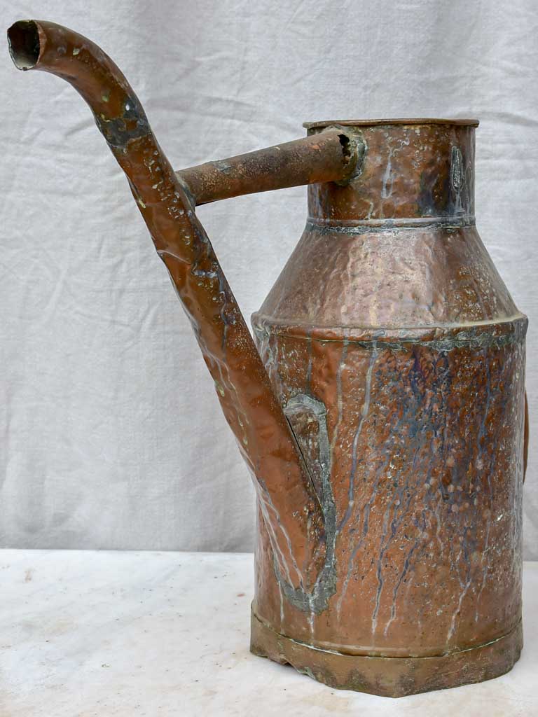Rustic antique French copper watering can