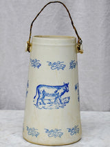 Antique French milk pitcher with cow and flowers