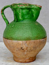 Antique French pitcher with matte green glaze
