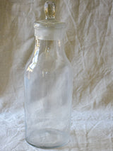 Antique French apothecary glass bottle with lid