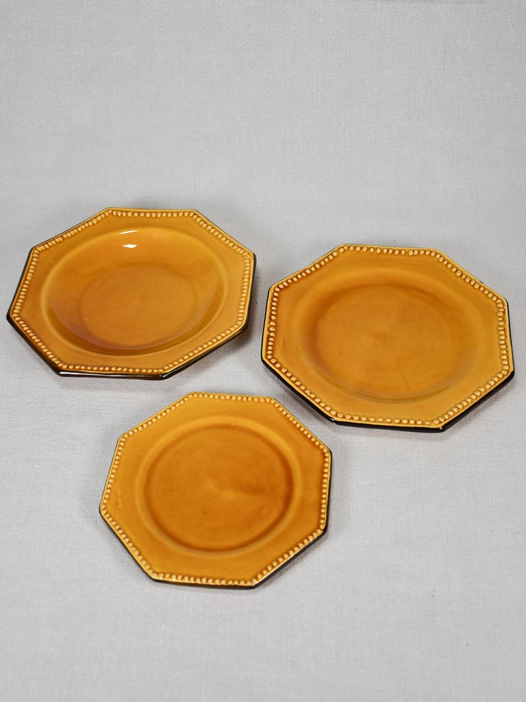 1950s octagonal Vallauris dinner set with yellow ocher glaze