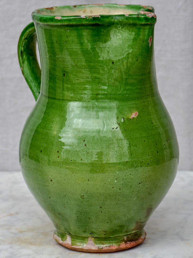 Antique French pitcher with green glaze