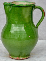 Antique French pitcher with green glaze