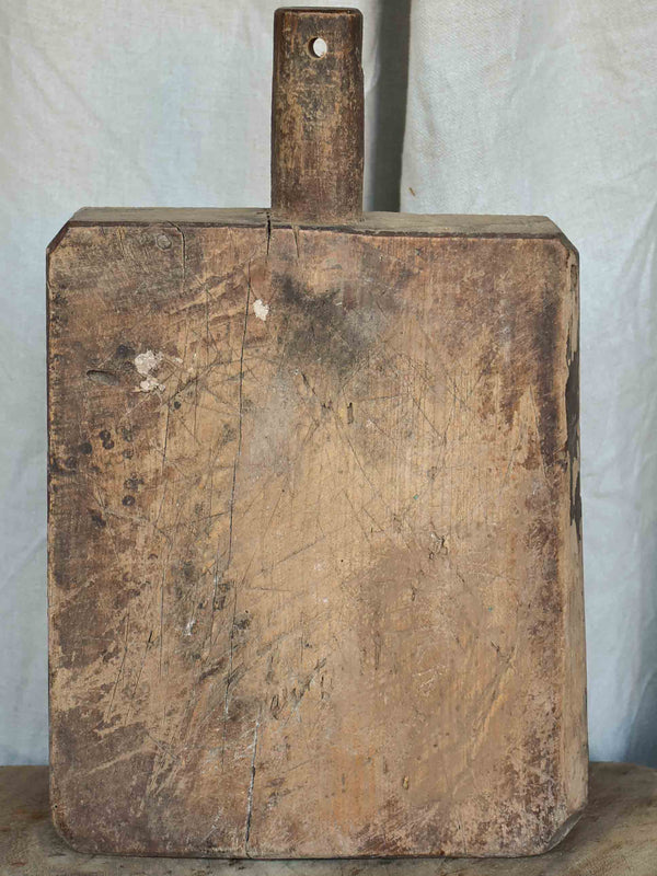 Antique French cutting board with worn surface 15 ¼''