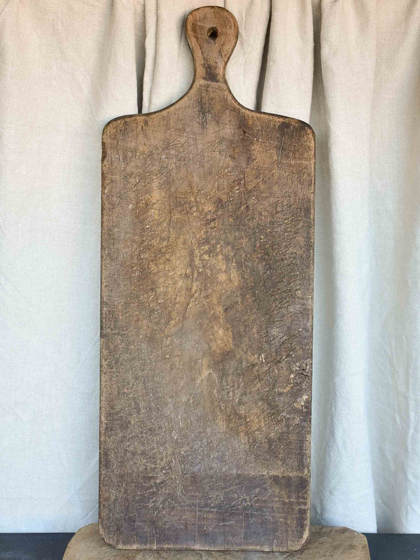 Very large antique French cutting board - puzzle piece silhouette  29 ½''
