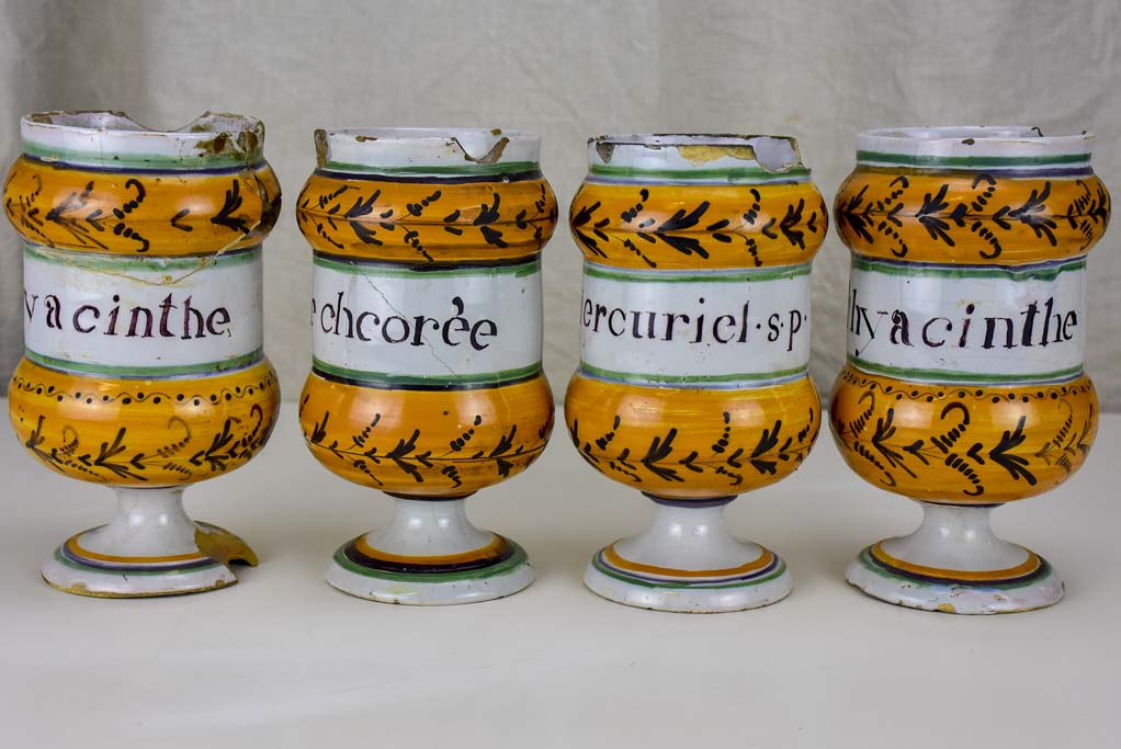 Collection of four antique French apothecary jars