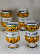 Collection of four antique French apothecary jars