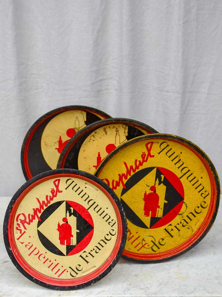 Collection of four round bistro trays - Quinquina