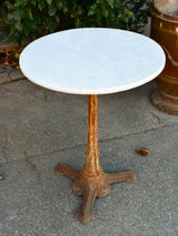 Antique Spanish bistro tables with marble tops