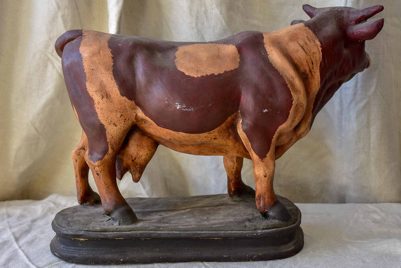 Pair of Aged Cows Statuettes