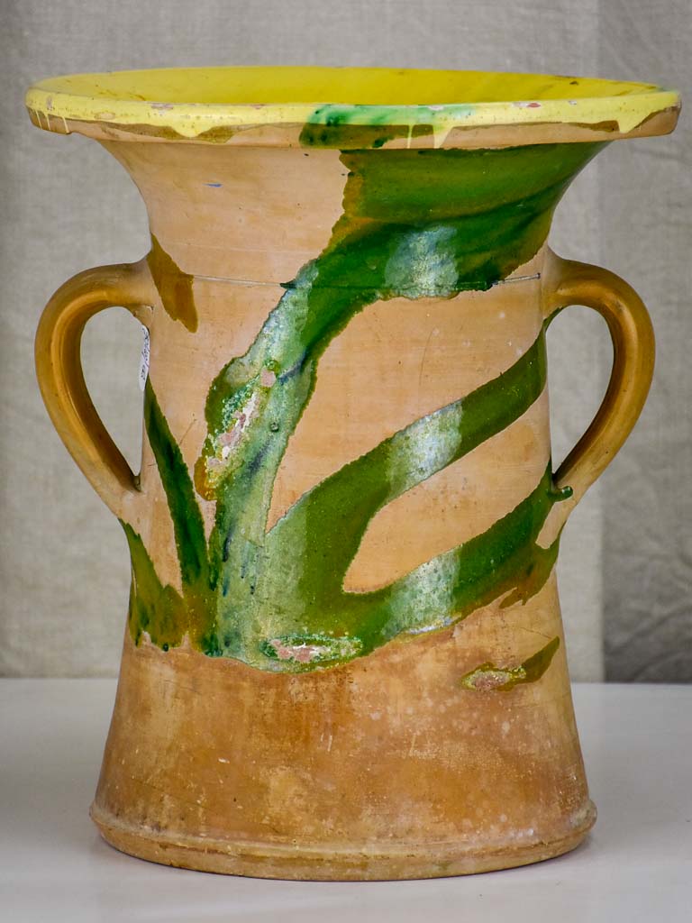 Antiuqe Spanish pot with yellow and green glaze.