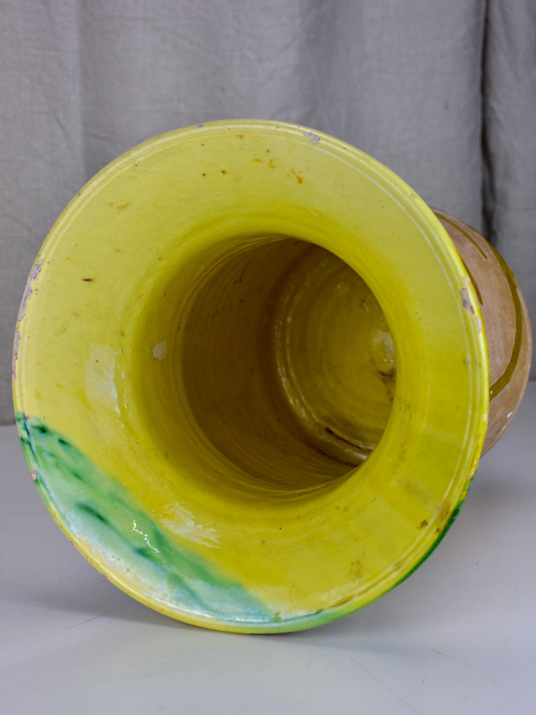 Antique Spanish pot with yellow and green glaze.