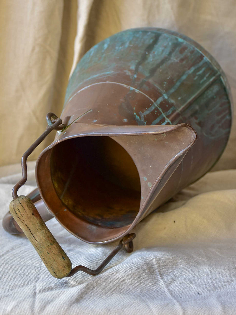 Antique French copper water pitcher with wooden handle